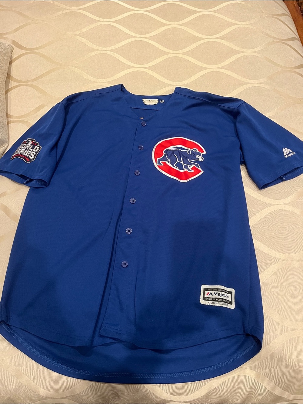 Majestic Royal Blue Cubs Button-Up Jersey with Red & White Logo.